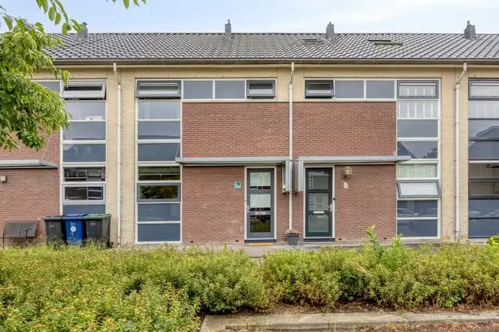 Tussenwoning te koop: Olle Kapoenstraat 10, Stripheldenbuurt Midden- west Almere