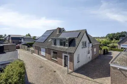 Twee-onder-één-kap te koop: Postweg 25, Wagenberg noordwest Wagenberg