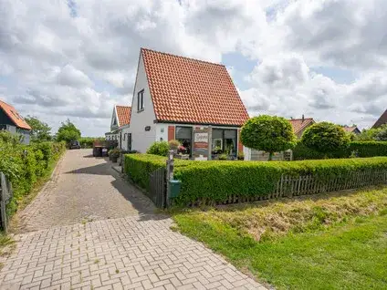 Hoekwoning te koop: Postweg 54, Verspreide huizen in de polders Eierland en Eendracht De Cocksdorp