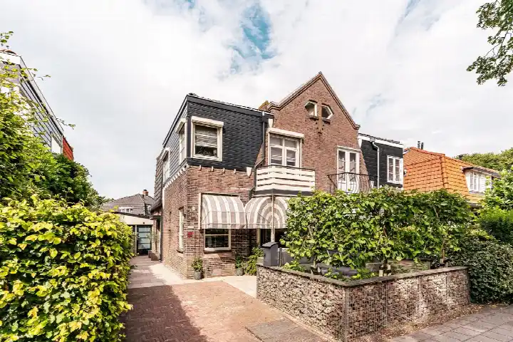Tussenwoning te koop: Rollandslaan 51, Ramplaankwartier Haarlem