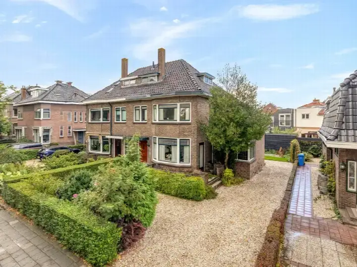 Twee-onder-één-kap te koop: Singel 103, Bloemen- en Bomenkwartier Woerden
