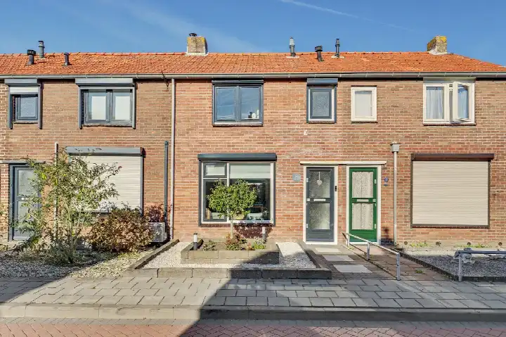 Tussenwoning te koop: Slotstraat 59, Kruiningen - Kern Kruiningen