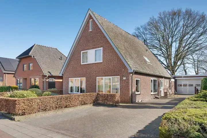 Vrijstaande woning te koop: Spoorstraat 11, Dorp Daarlerveen Daarlerveen