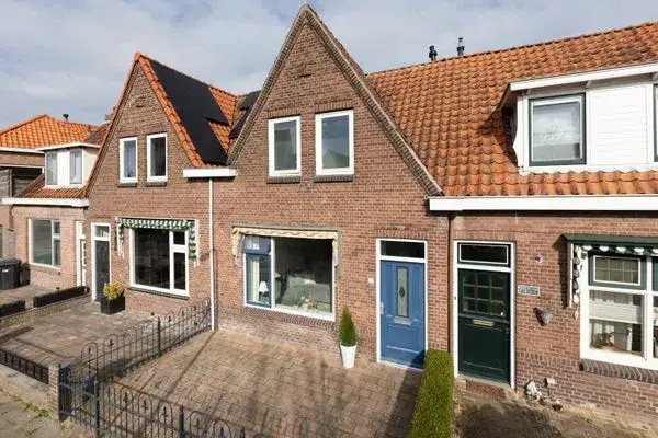Terraced house for sale: Willem de Zwijgerstraat 73, Sperkhem en industrieterrein Houkesloot Sneek