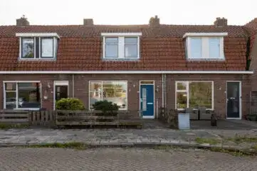Tussenwoning te koop: Willem de Zwijgerstraat 94, Sperkhem en industrieterrein Houkesloot Sneek