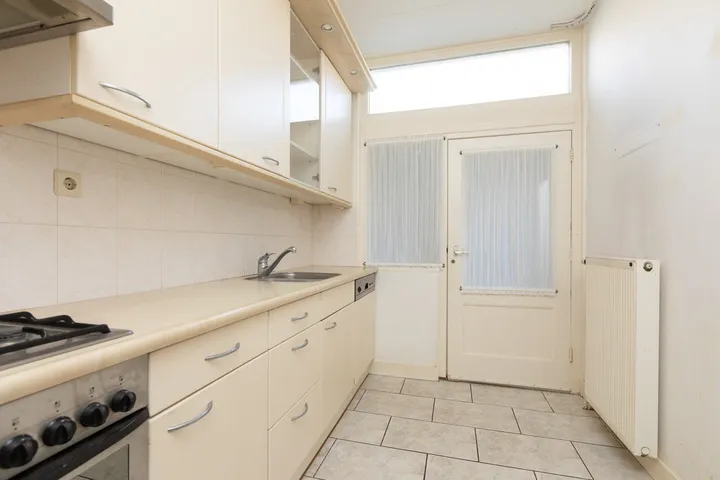 Tussenwoning te koop: Tjotterstraat 11, Sneek