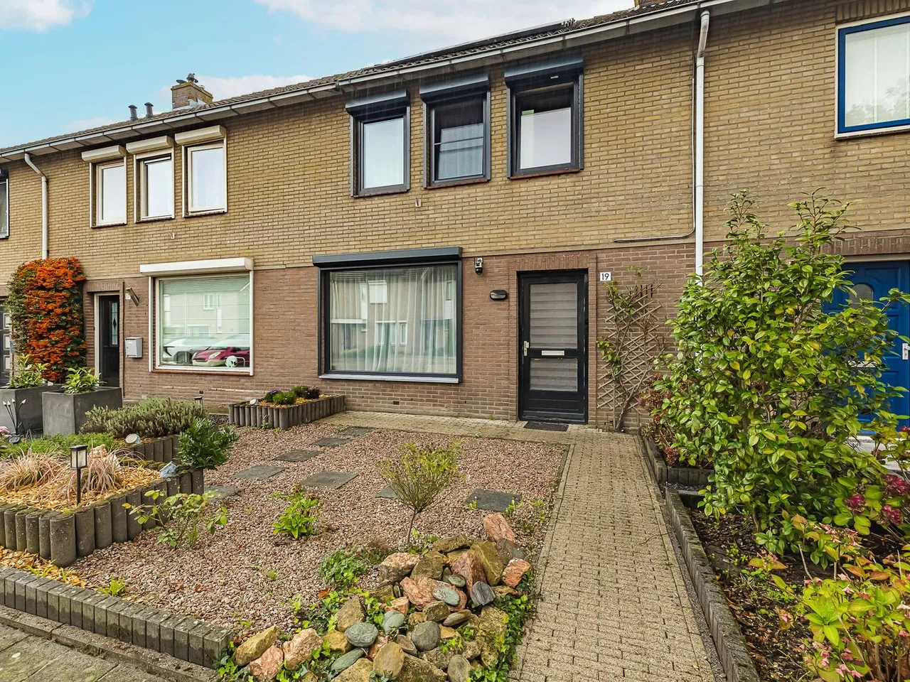 Tussenwoning te koop: Tooropstraat 19, Sprang-Capelle