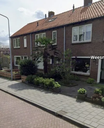 Tussenwoning te koop: Weesmolenstraat 29, Ooltgensplaat woonkern Ooltgensplaat