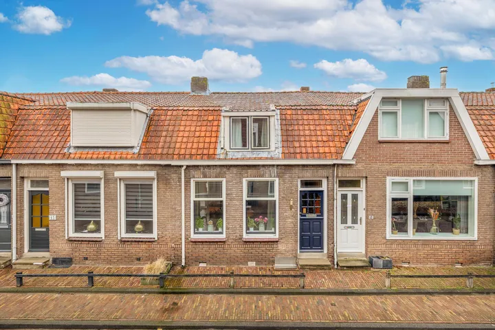 Tussenwoning te koop: Westelijke Achterweg 43, Sommelsdijk centrum Sommelsdijk