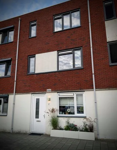 Tussenwoning te koop: Zuiderspoorstraat 37, Getfert Enschede